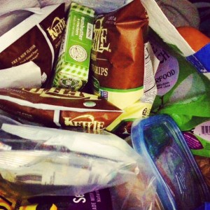 On my recent trip to Raleigh, NC, this is what I had in my bag: Kettle chips, GoPicnic box, Glutino cookies, sandwiches from home, kale chips, seaweed snax, and Udi's Gluten Free bars. What do you travel with for a gluten-free trip?